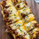 Cheesy Sloppy Joe Garlic Bread